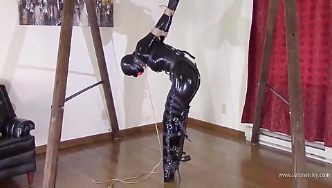 Burglar In Latex Tightly Bound And Gagged